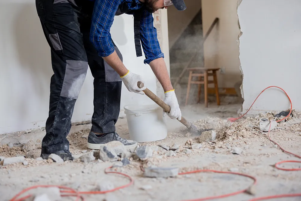 picking up house damaged rubble