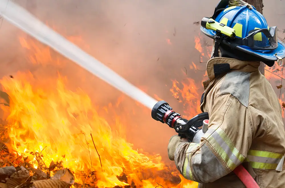 fire fighter fighting a fire